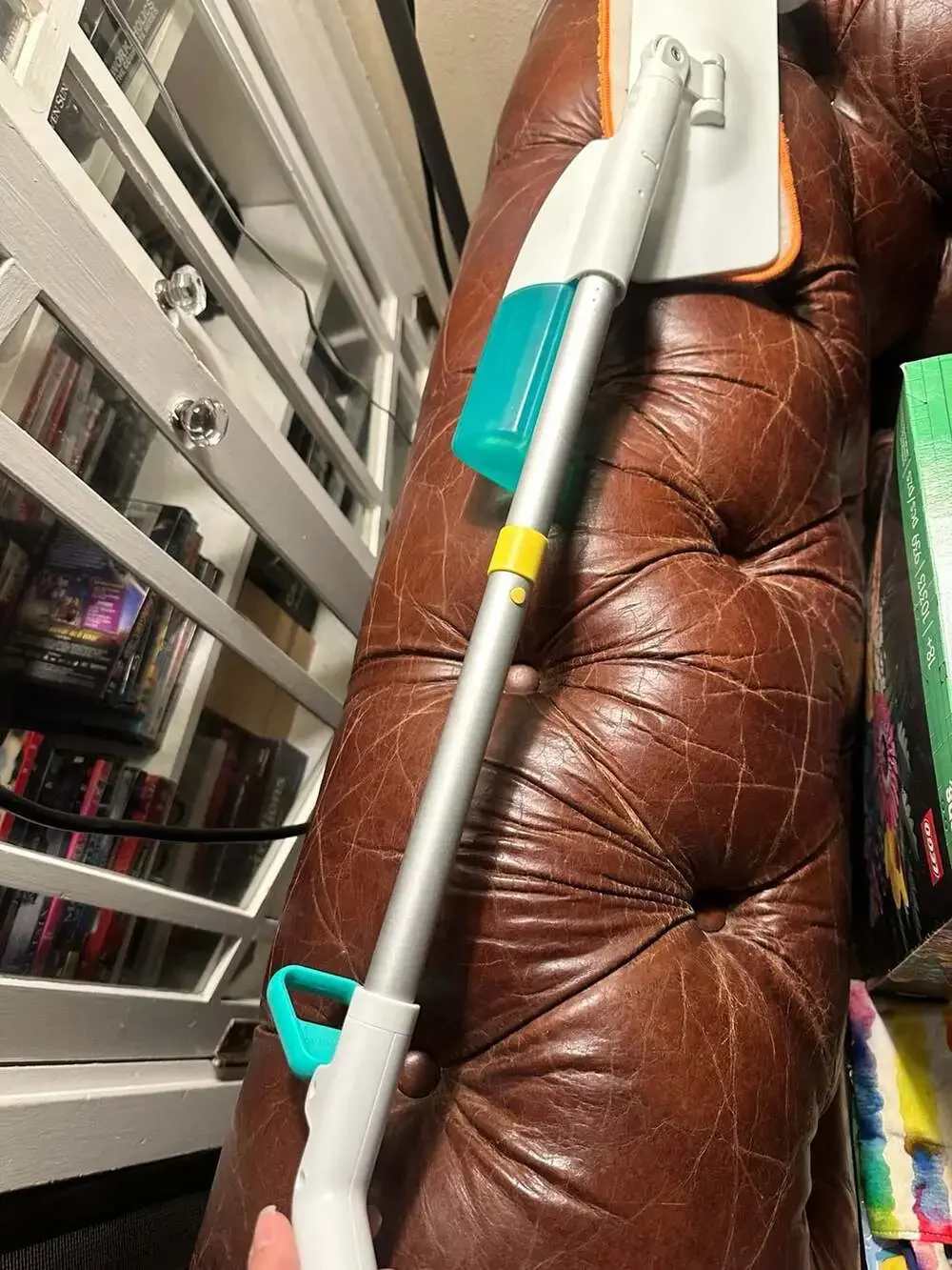 Lovevery Squeeze and Spray Mop from The Storyteller Play Kit